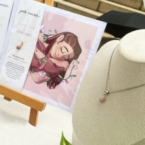 Charms endentif de rhodocrosite et son illustration sur le thème de l'amour de soi
